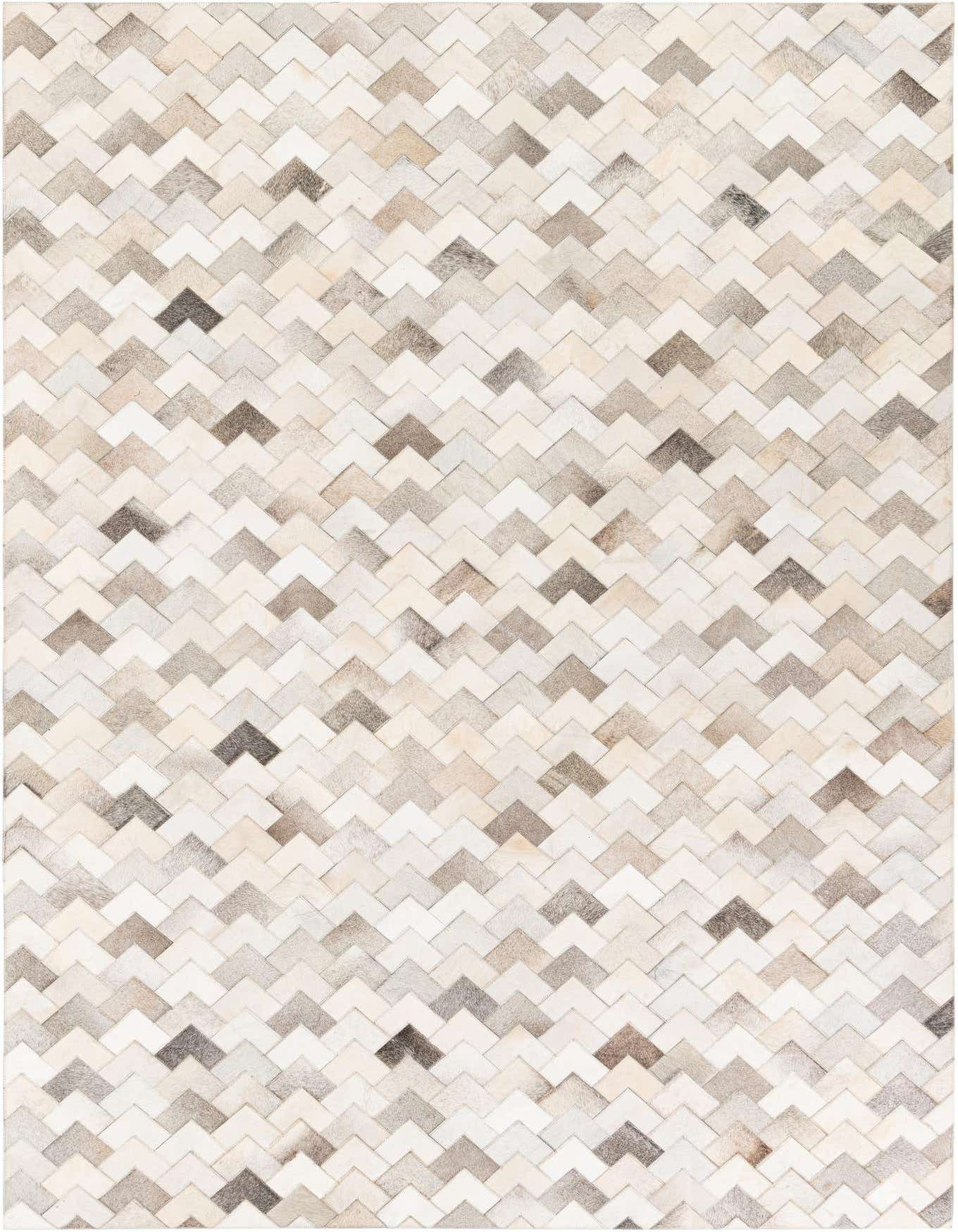 A 6x9 rectangular Cowhide Stocks rug featuring a modern chevron pattern in various shades of multi-colored cowhide and leather.