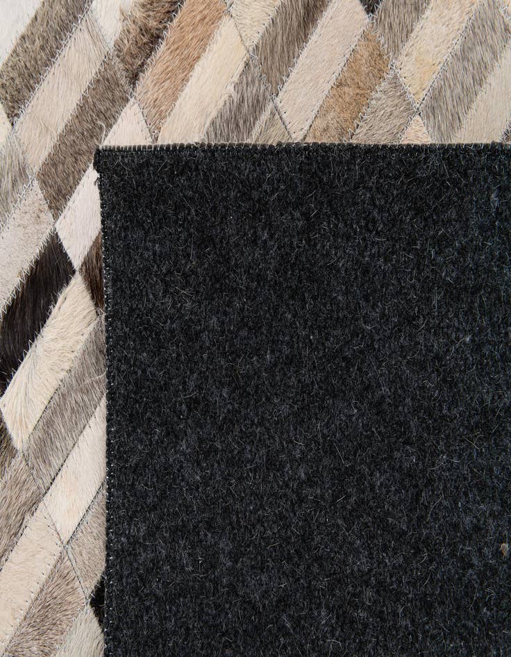Detail image of  6' x 9' Cowhide Stocks Rug