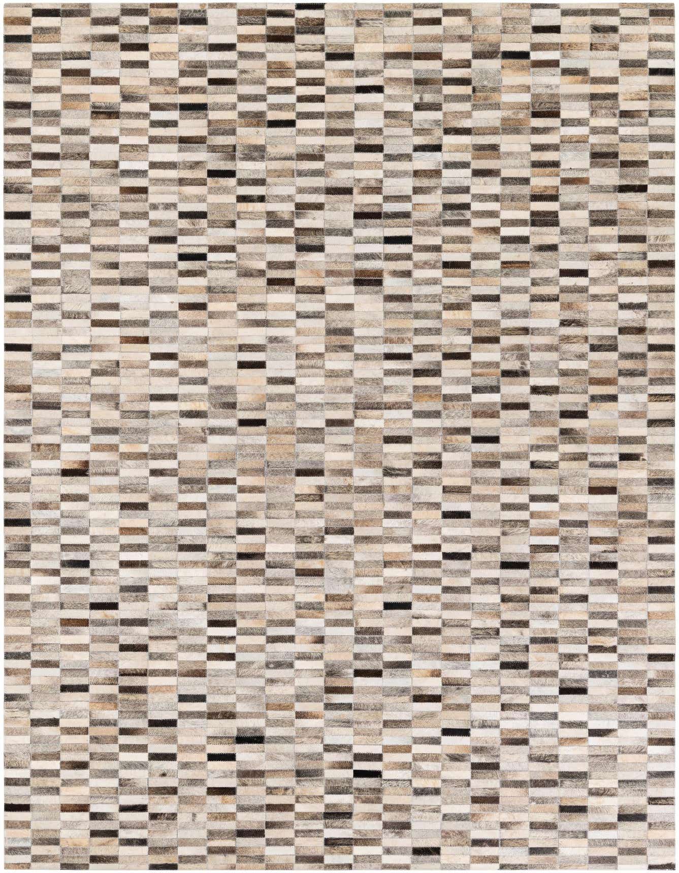 A 6x9 rectangular multi-colored modern cowhide rug with a patchwork design, ideal for a living room.