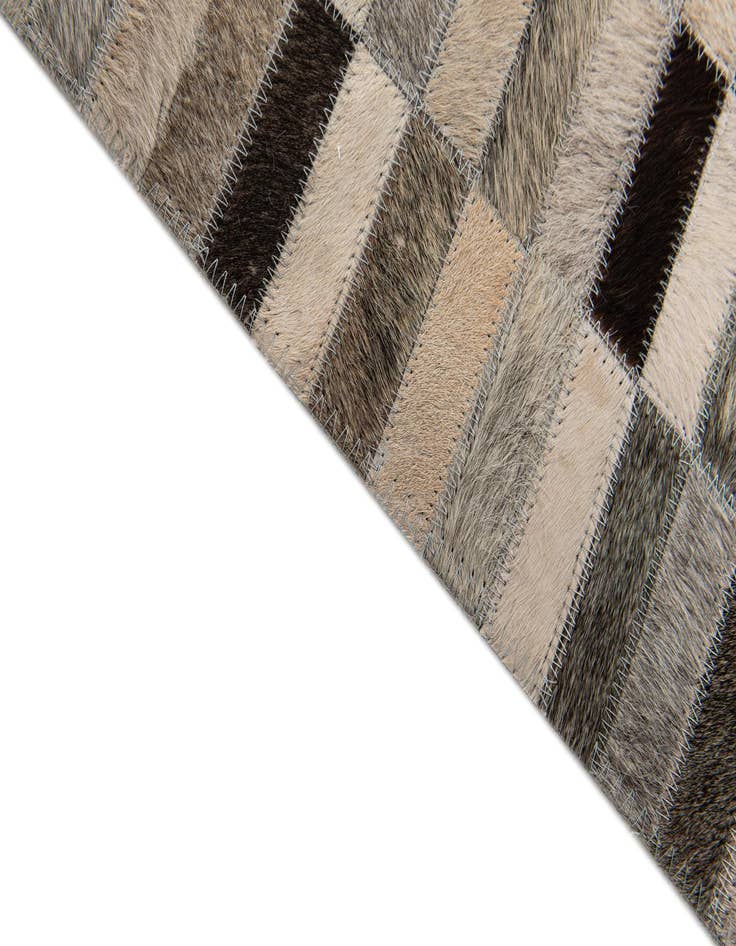 Detail image of  6' x 8' 11 Cowhide Stocks Rug