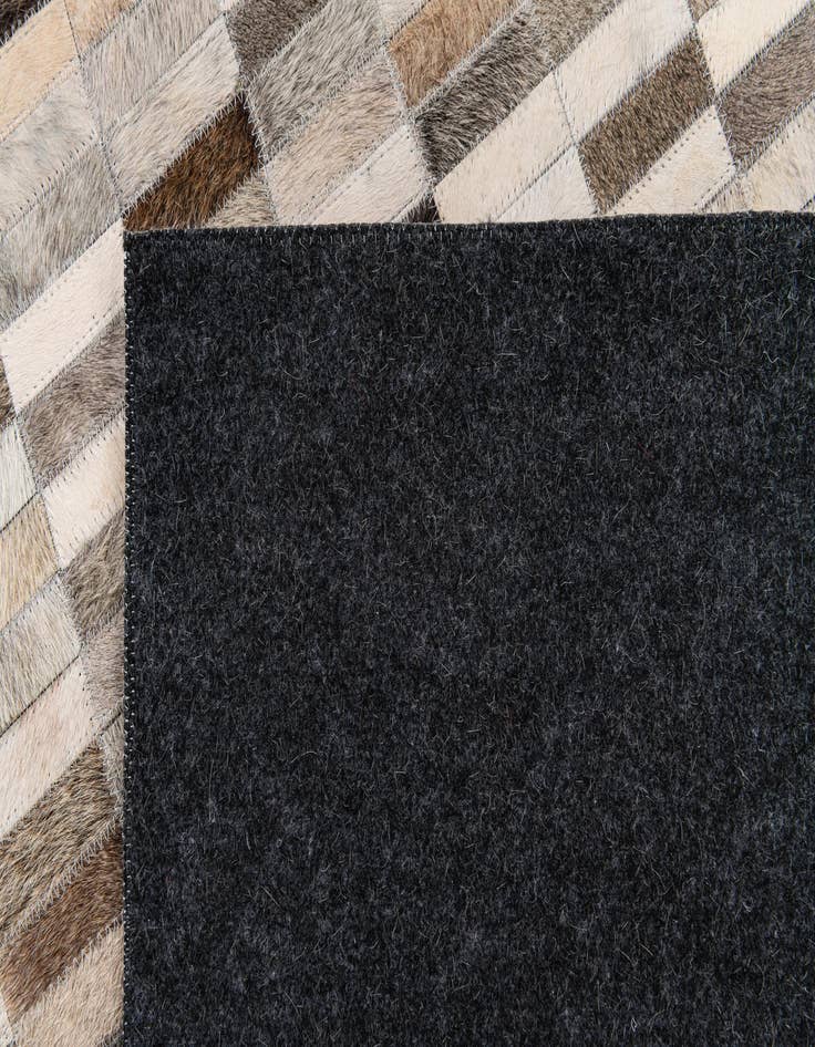 Detail image of  6' x 8' 11 Cowhide Stocks Rug