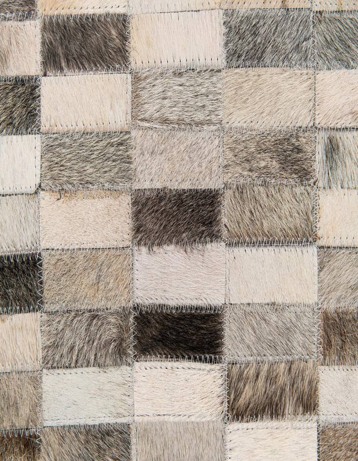 Detail image of  6' x 8' 11 Cowhide Stocks Rug