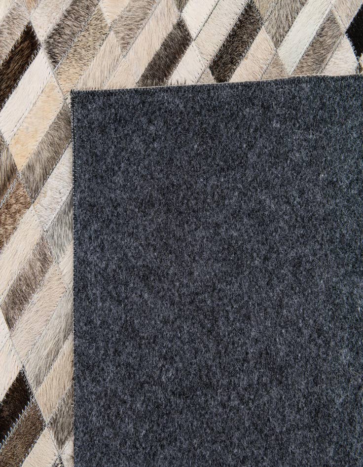 Detail image of  6' x 8' 11 Cowhide Stocks Rug