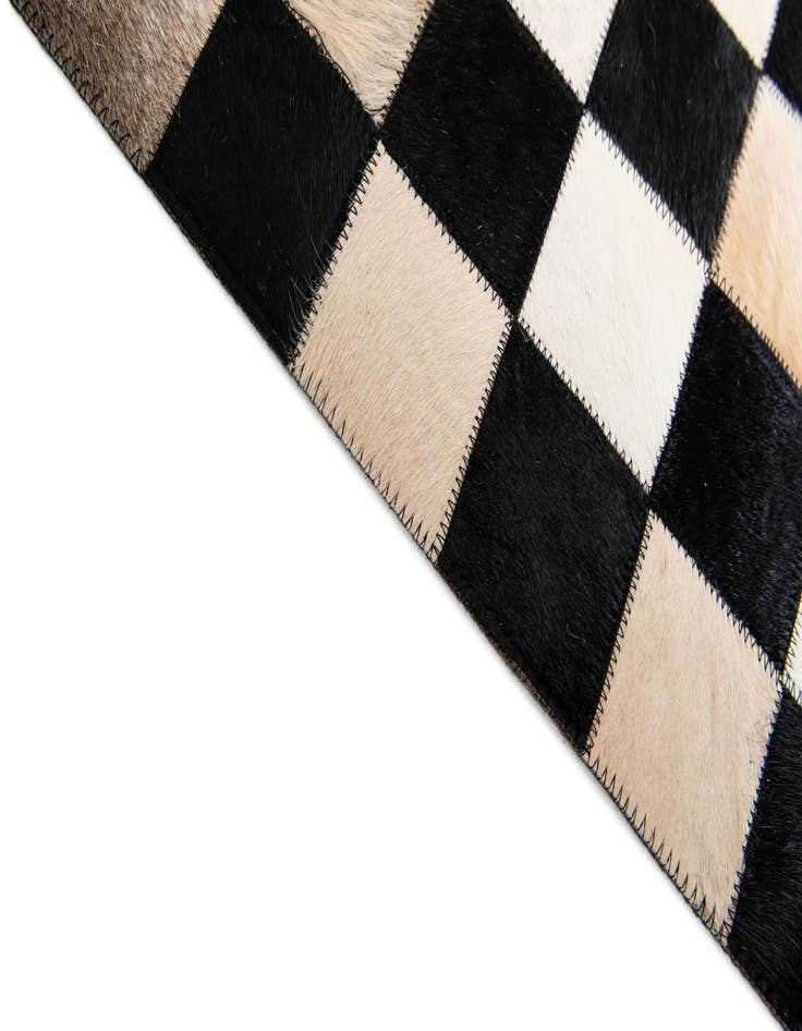 Detail image of  6' 8 x 9' 9 Cowhide Stocks Rug