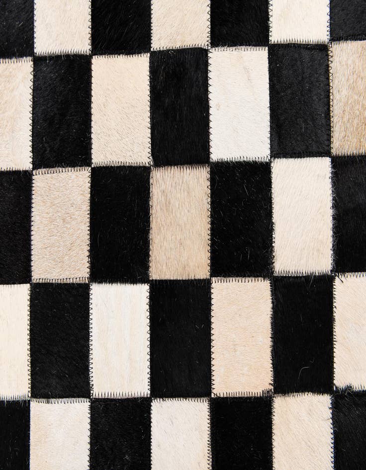 Detail image of  6' 8 x 9' 9 Cowhide Stocks Rug