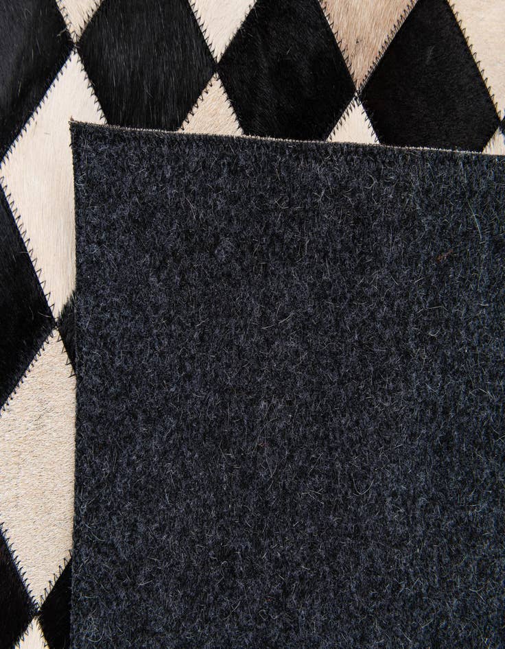 Detail image of  6' 8 x 9' 9 Cowhide Stocks Rug