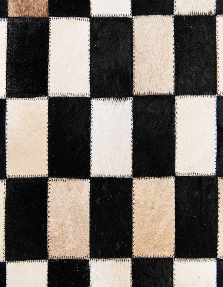 Detail image of  6' 8 x 9' 9 Cowhide Stocks Rug