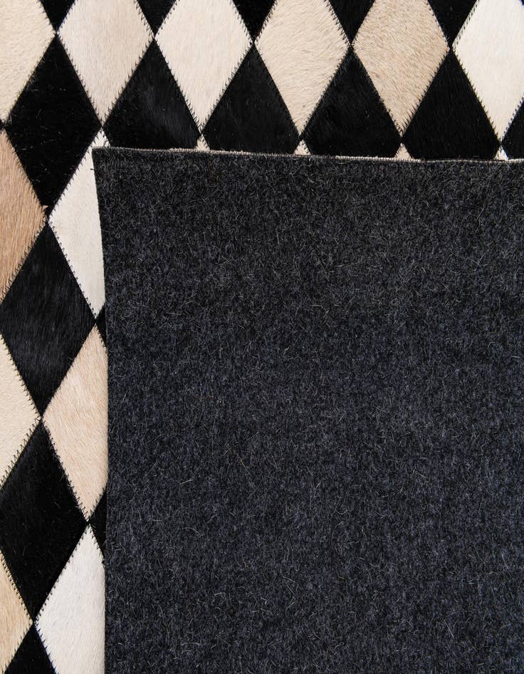 Detail image of  6' 8 x 9' 9 Cowhide Stocks Rug