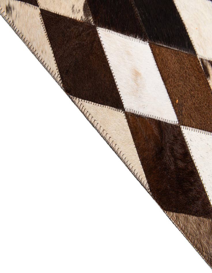 Detail image of  6' 7 x 9' 10 Cowhide Stocks Rug