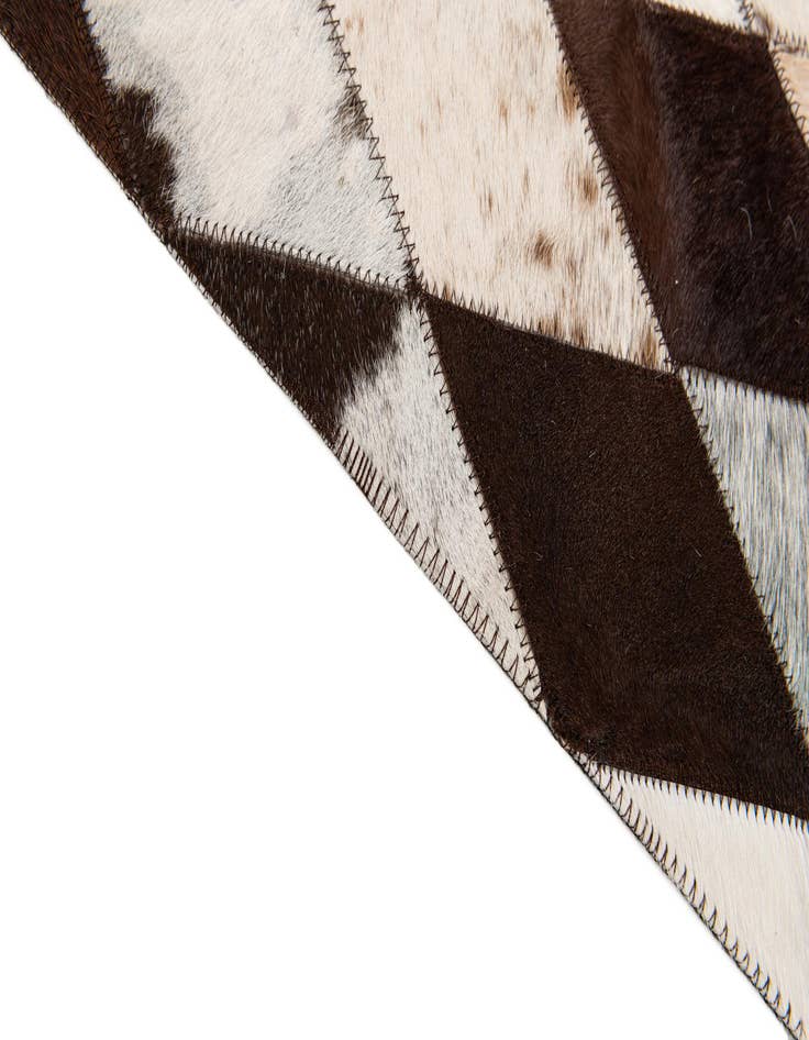 Detail image of  6' 6 x 9' 9 Cowhide Stocks Rug