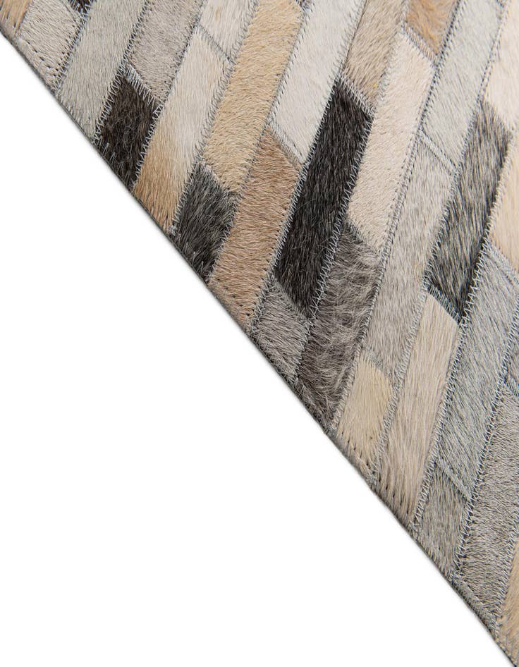 Detail image of  6' 7 x 10' Cowhide Stocks Rug