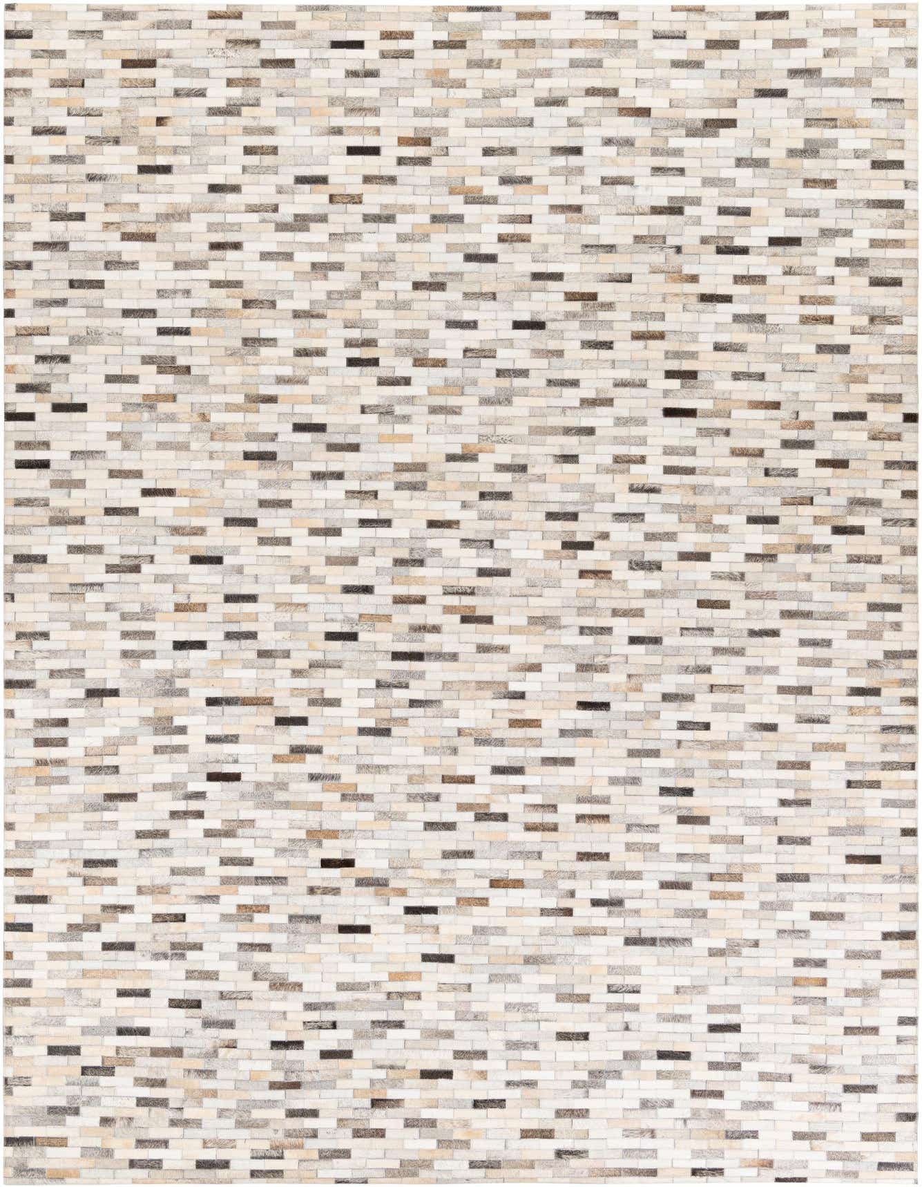 A rectangular 7x10 multi-colored modern cowhide rug featuring a stripe pattern of varying natural hide rectangles in white, beige, brown, and black.