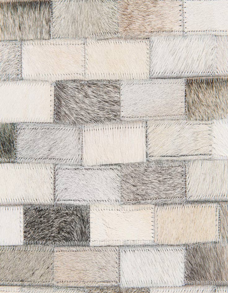 Detail image of  6' 8 x 9' 11 Cowhide Stocks Rug