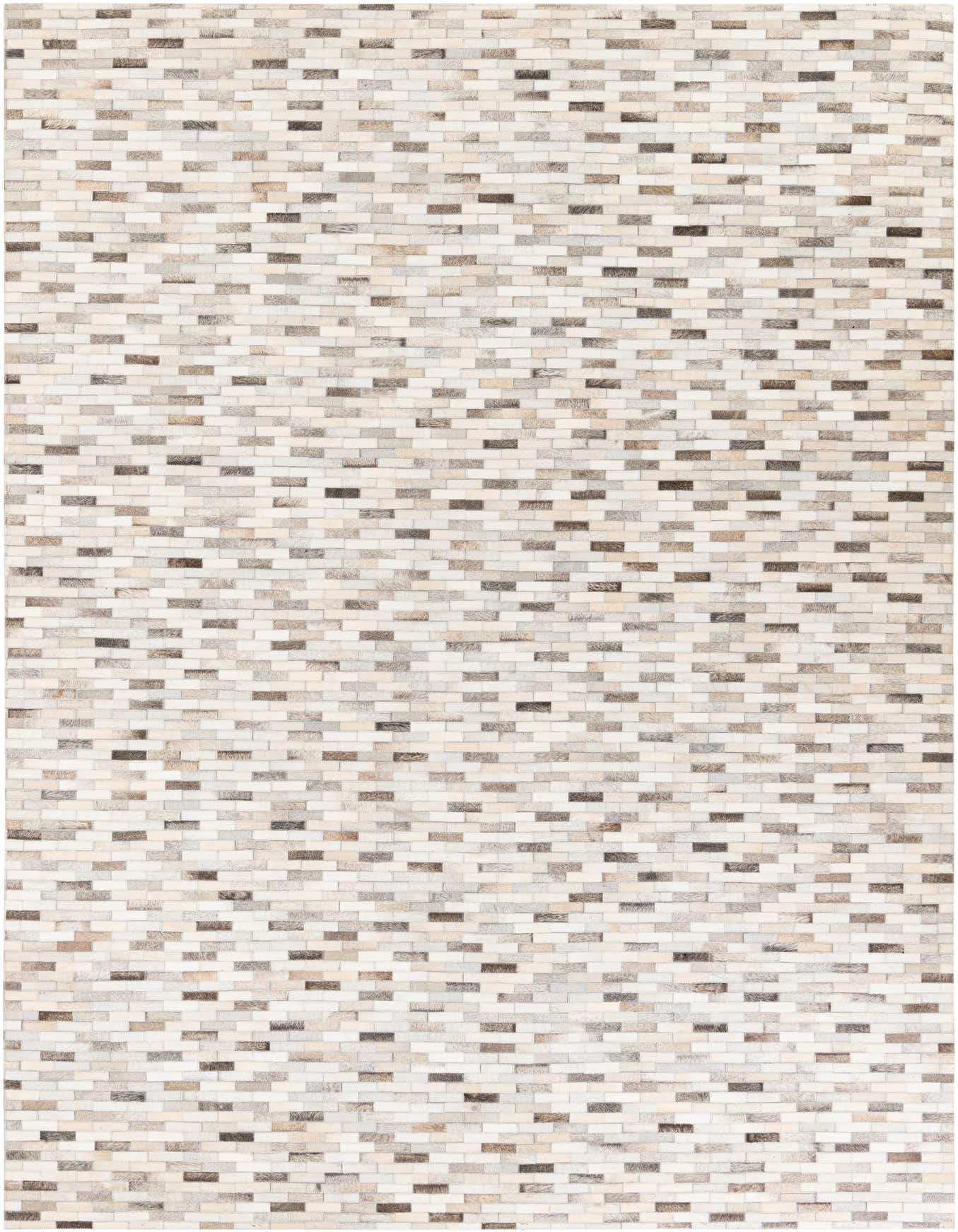 A rectangular 7x10 multi-colored modern cowhide rug with a brick-like pattern, perfect for a living room.