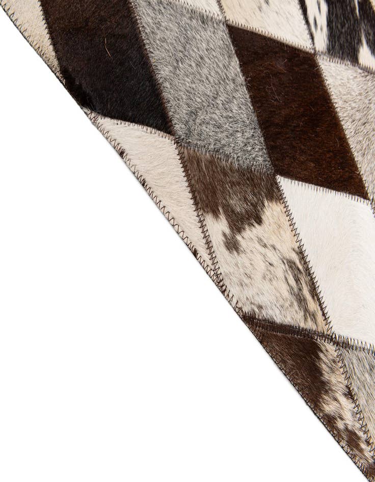 Detail image of  6' 7 x 9' 9 Cowhide Stocks Rug
