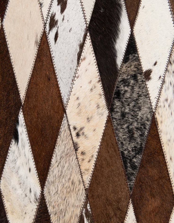 Detail image of  6' 7 x 9' 9 Cowhide Stocks Rug