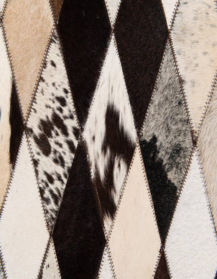 Detail image of  6' 7 x 9' 10 Cowhide Stocks Rug