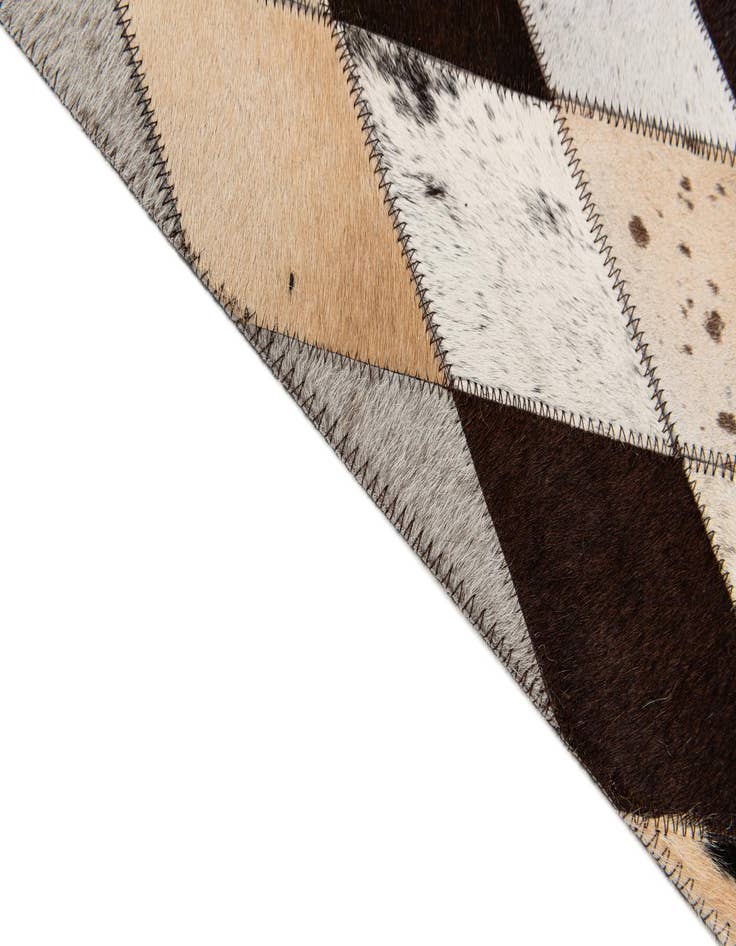 Detail image of  6' 7 x 9' 11 Cowhide Stocks Rug