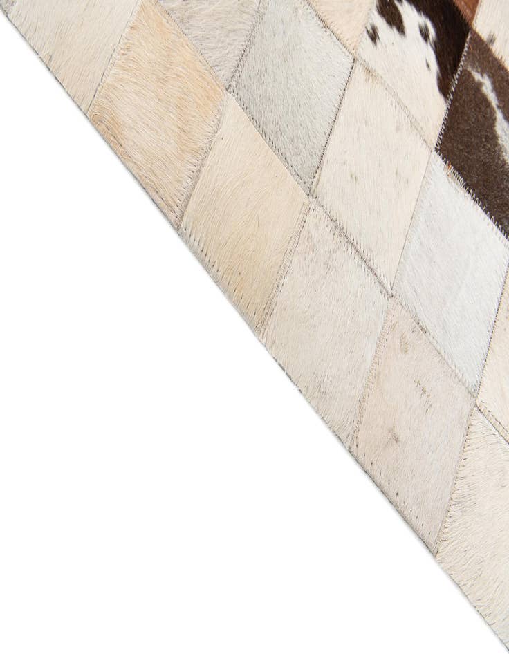 Detail image of  5' x 7' 11 Cowhide Stocks Rug