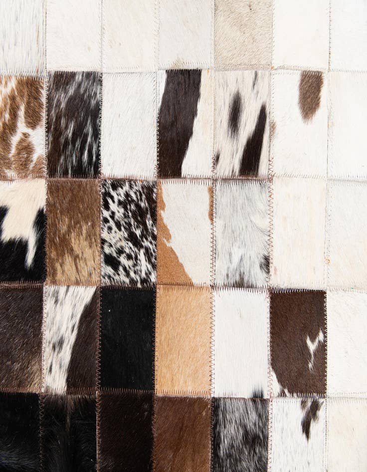 Detail image of  5' x 7' 11 Cowhide Stocks Rug