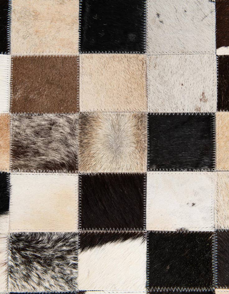 Detail image of  5' 2 x 8' Cowhide Stocks Rug