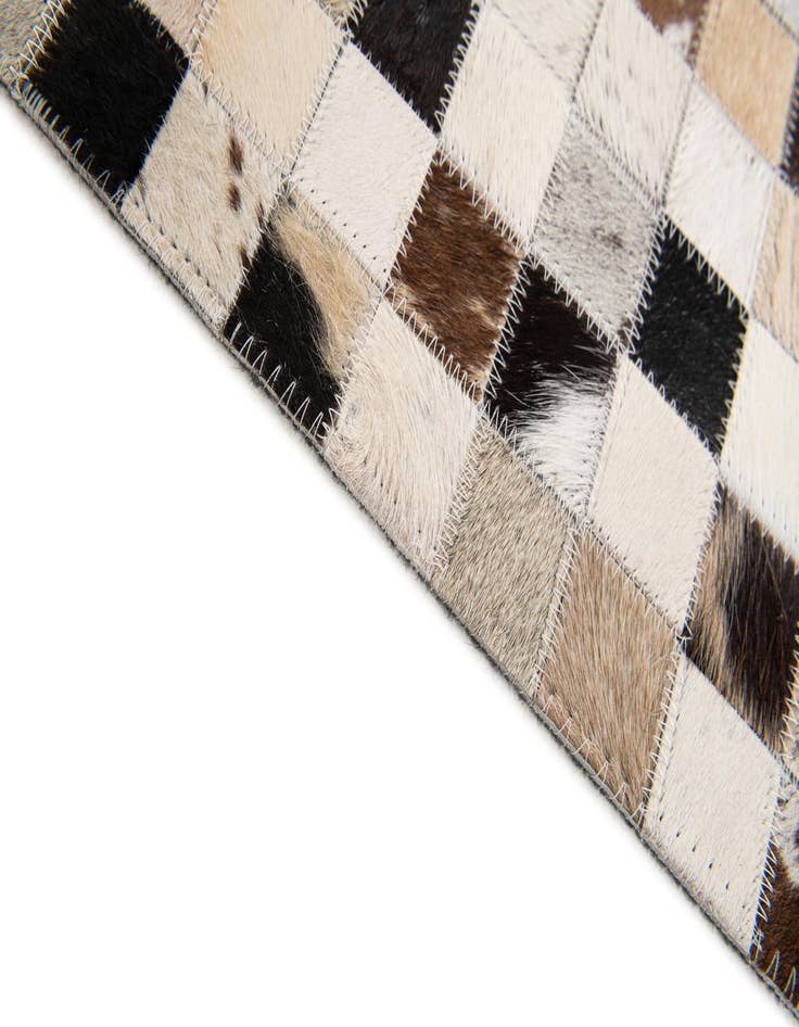 Detail image of  5' x 7' 10 Cowhide Stocks Rug