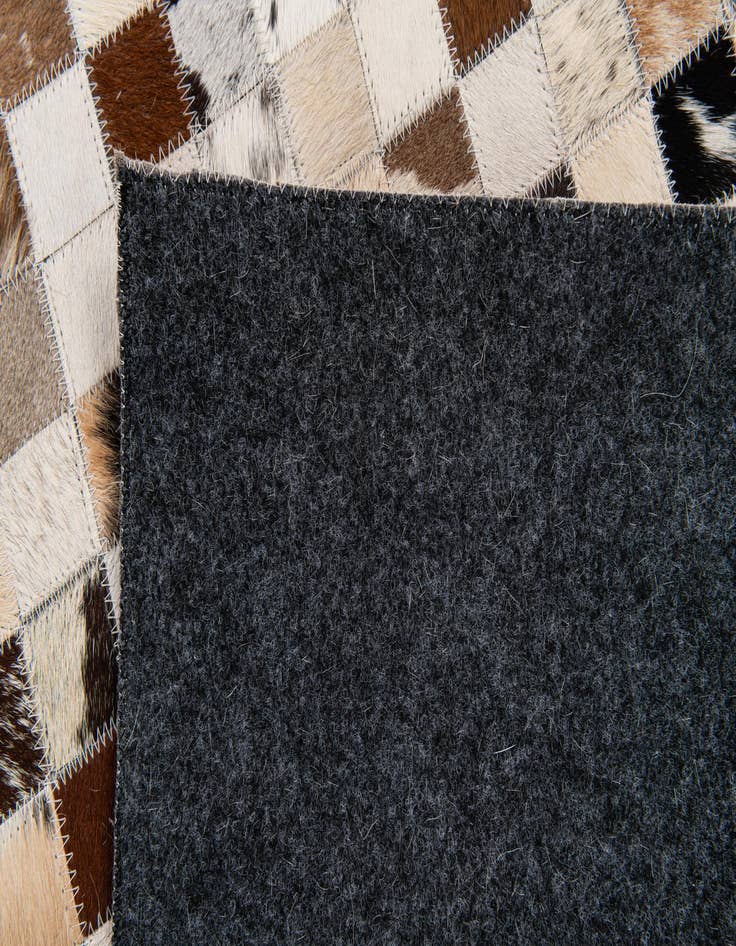 Detail image of  5' x 7' 10 Cowhide Stocks Rug