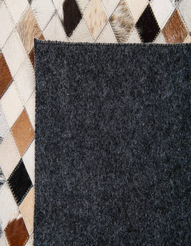 Detail image of  5' x 7' 10 Cowhide Stocks Rug
