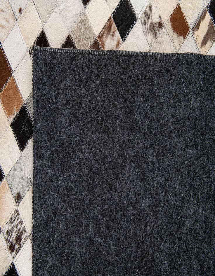 Detail image of  5' x 7' 10 Cowhide Stocks Rug