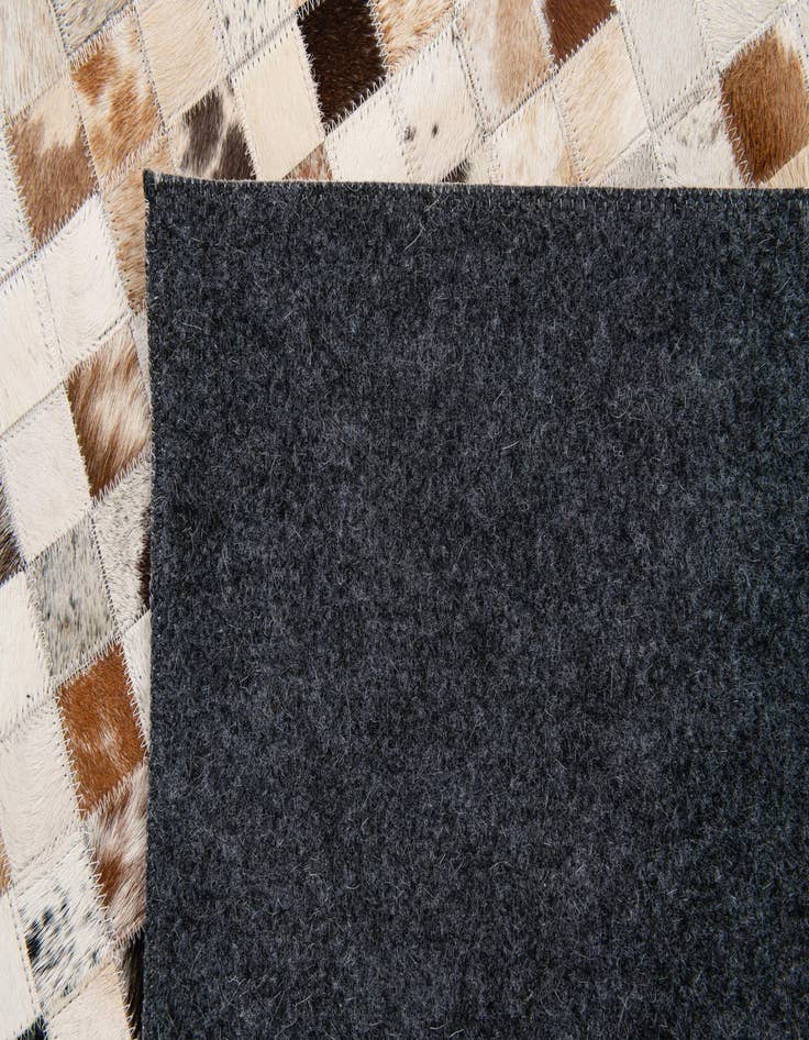 Detail image of  5' x 8' Cowhide Stocks Rug