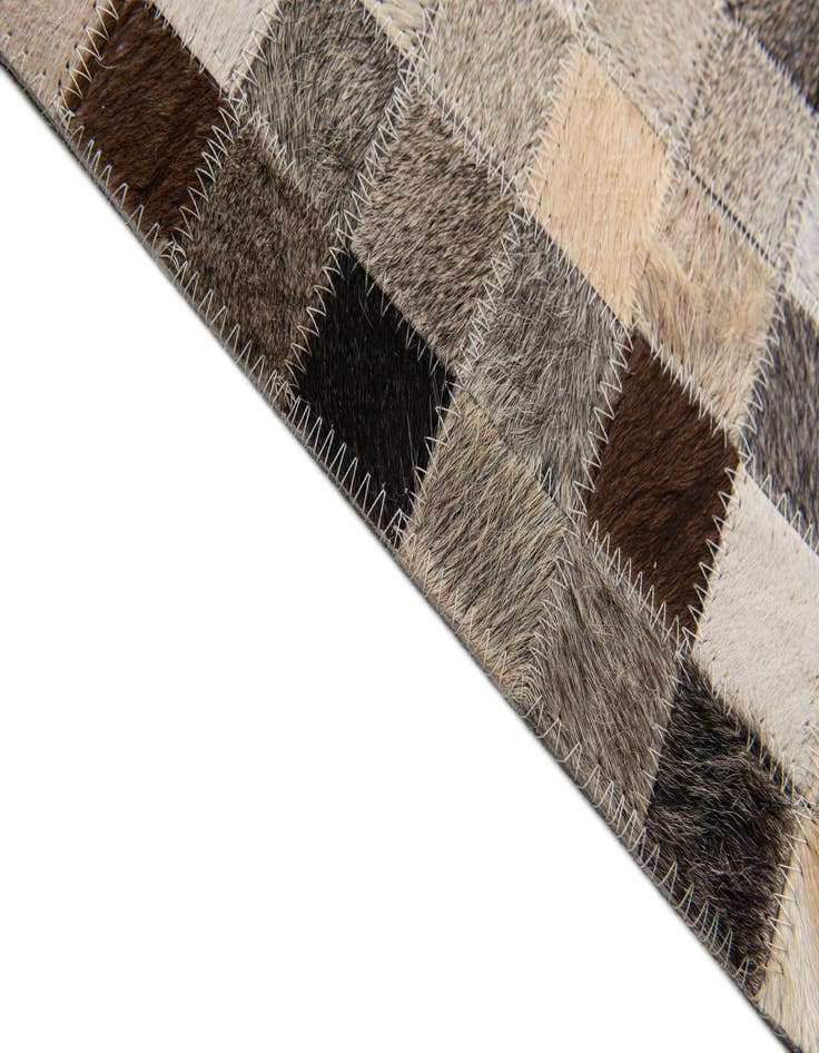 Detail image of  5' 2 x 7' 6 Cowhide Stocks Rug