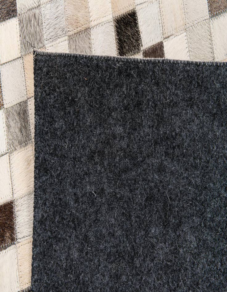 Detail image of  5' x 8' Cowhide Stocks Rug