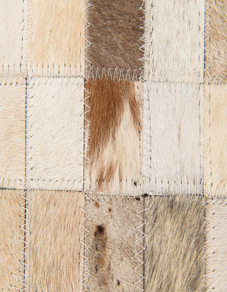 Detail image of  5' 3 x 7' 7 Cowhide Stocks Rug