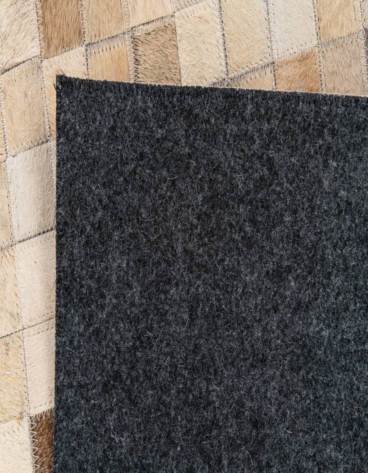 Detail image of  5' 3 x 7' 7 Cowhide Stocks Rug