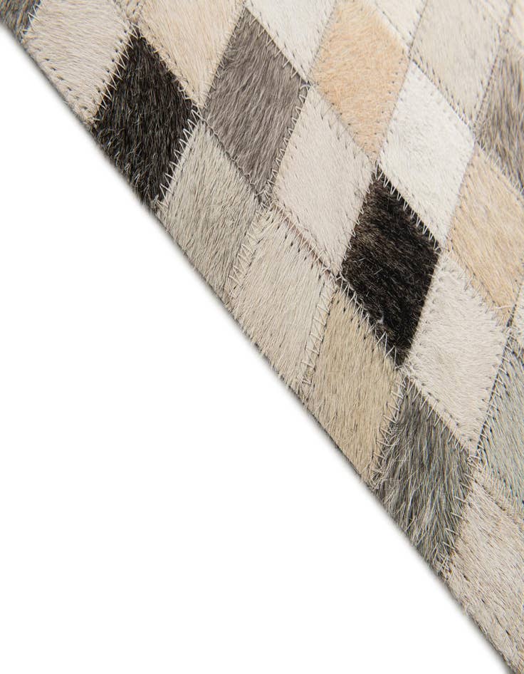 Detail image of  5' x 7' 11 Cowhide Stocks Rug