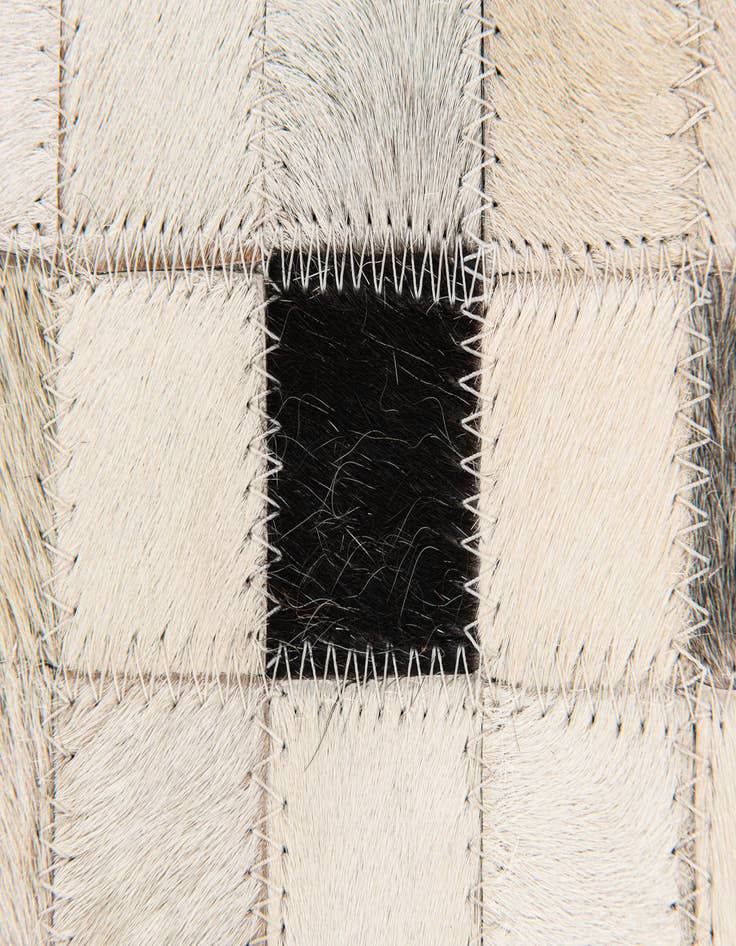 Detail image of  5' x 7' 11 Cowhide Stocks Rug