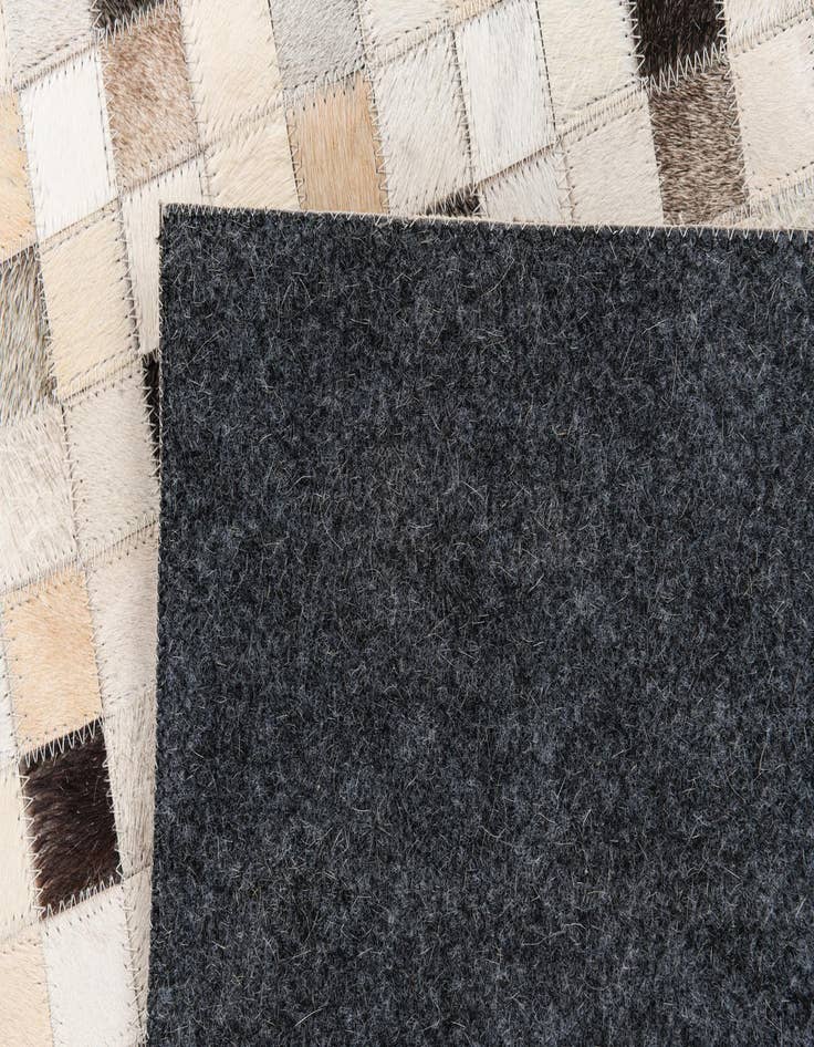 Detail image of  5' x 7' 11 Cowhide Stocks Rug