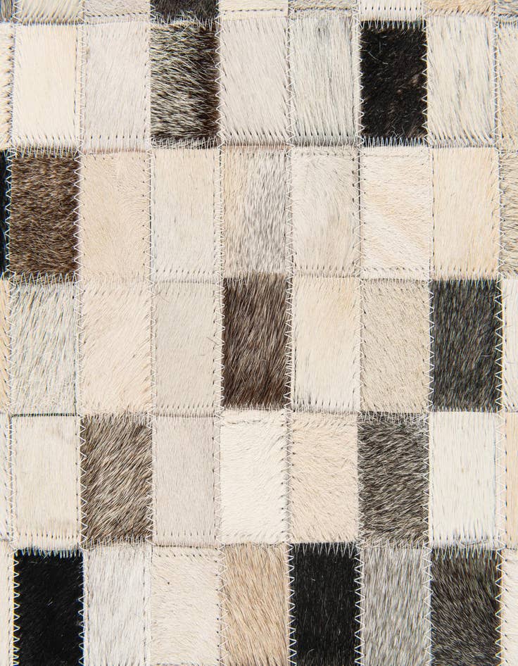 Detail image of  5' 1 x 8' 1 Cowhide Stocks Rug
