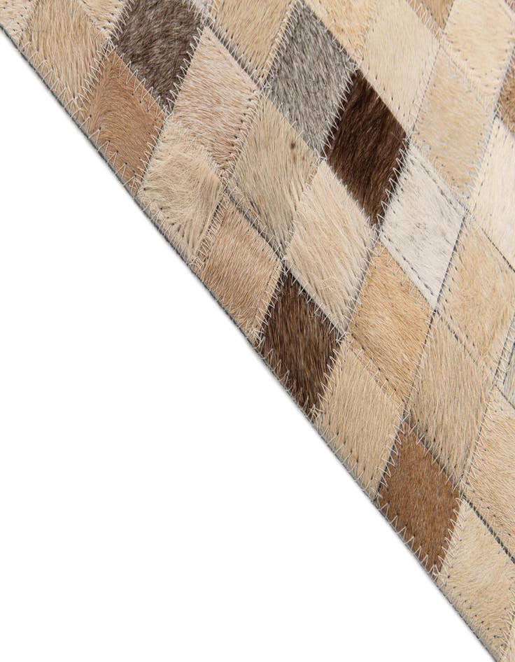 Detail image of  5' 3 x 7' 6 Cowhide Stocks Rug