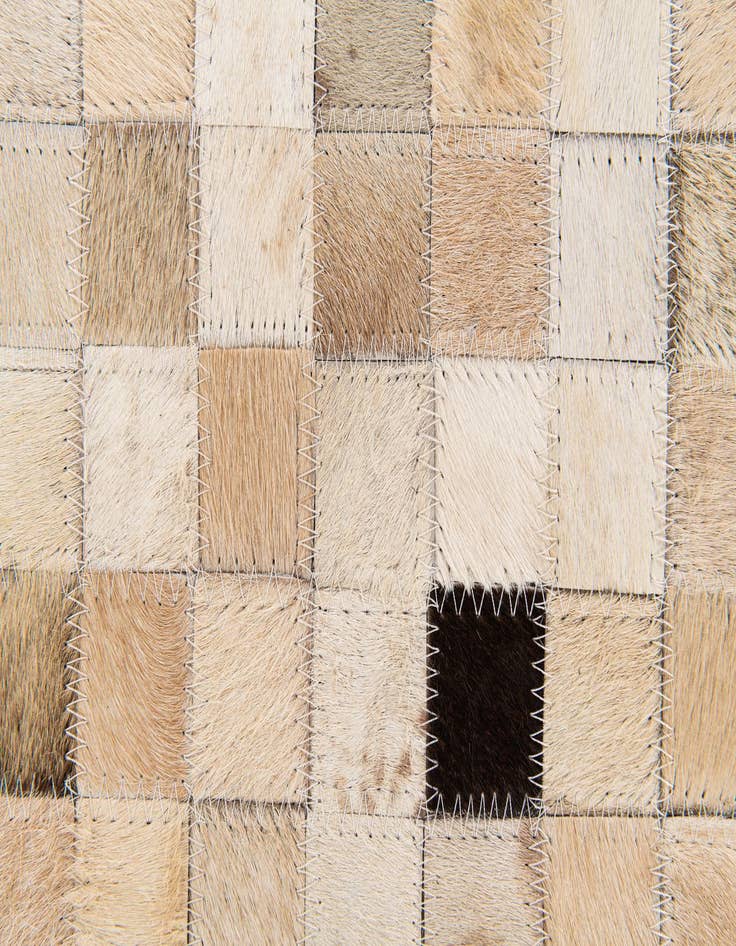 Detail image of  5' 3 x 7' 6 Cowhide Stocks Rug