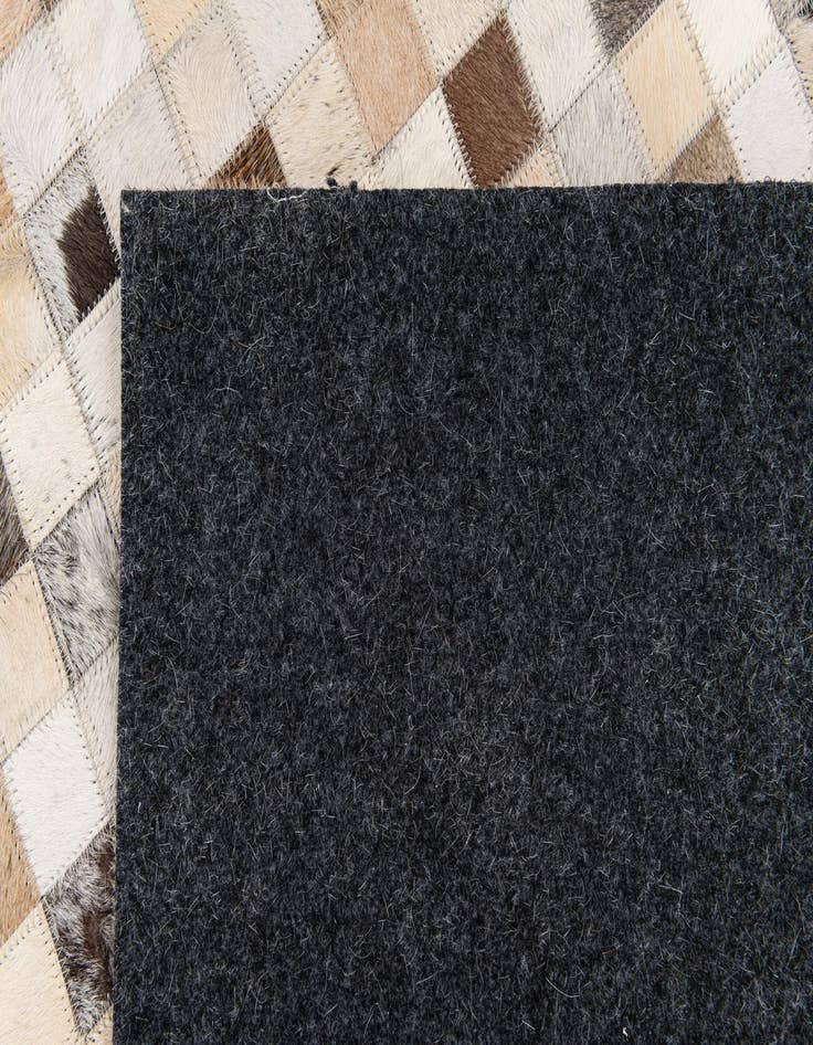 Detail image of  4' 11 x 8' Cowhide Stocks Rug
