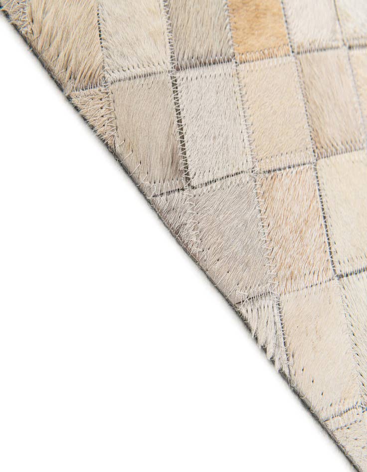 Detail image of  5' x 7' 11 Cowhide Stocks Rug