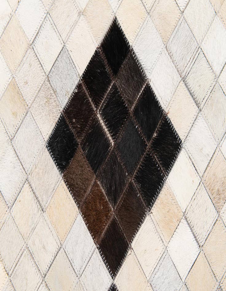 Detail image of  5' x 7' 11 Cowhide Stocks Rug