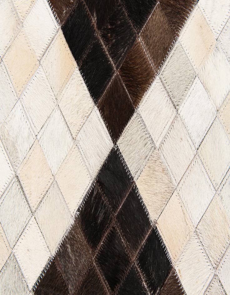 Detail image of  5' x 7' 11 Cowhide Stocks Rug