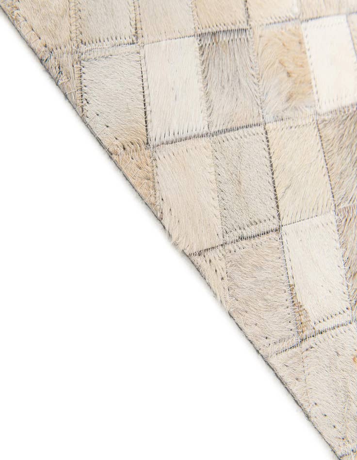 Detail image of  5' x 7' 11 Cowhide Stocks Rug