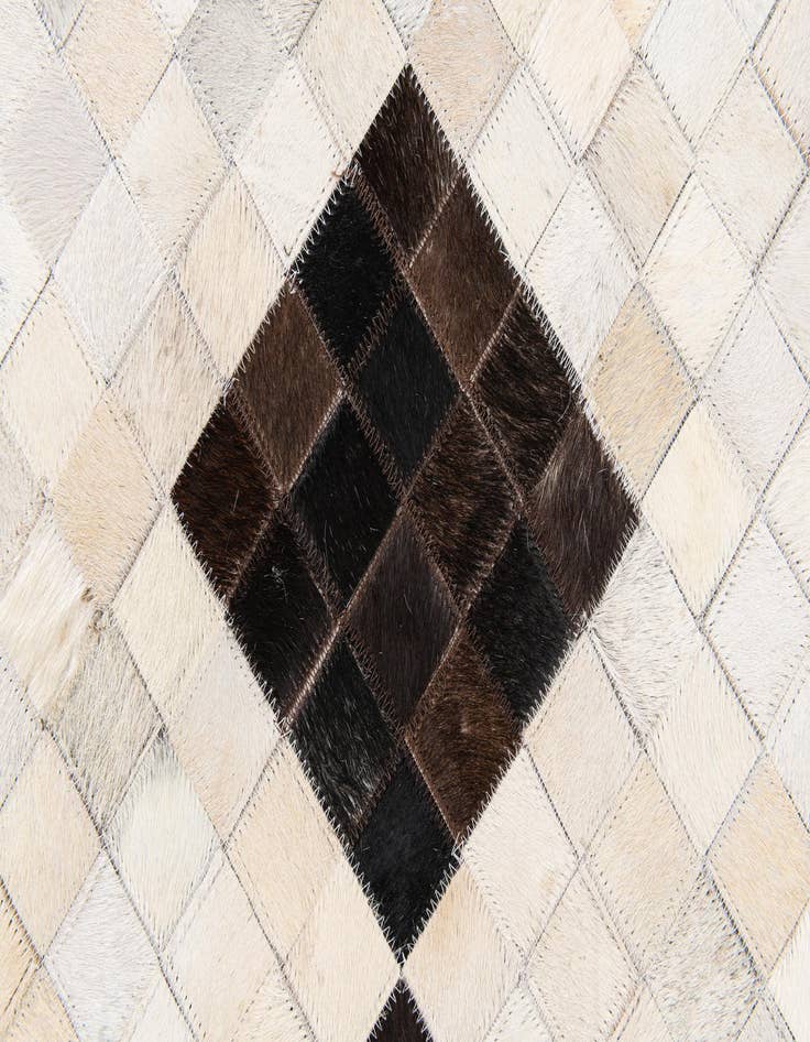 Detail image of  5' x 7' 11 Cowhide Stocks Rug