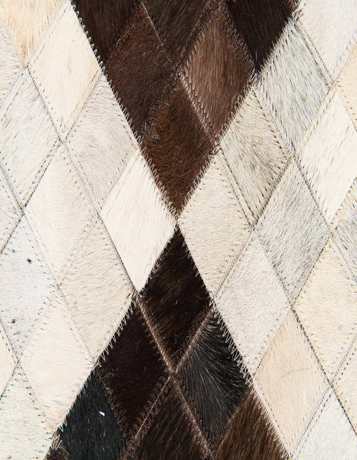 Detail image of  5' x 7' 11 Cowhide Stocks Rug