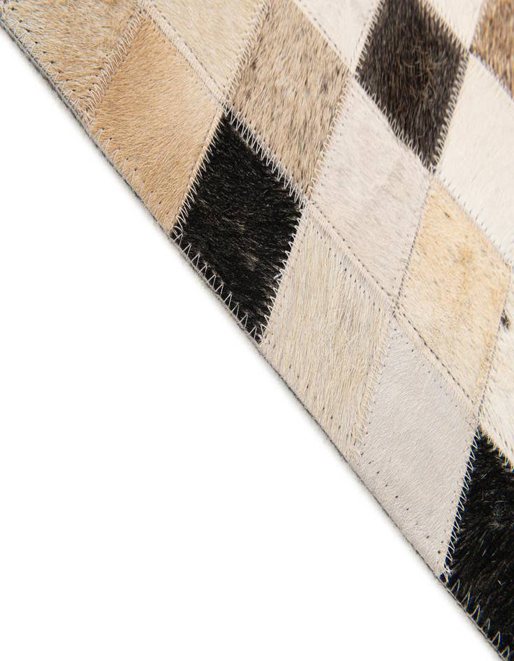 Detail image of  5' x 7' 11 Cowhide Stocks Rug