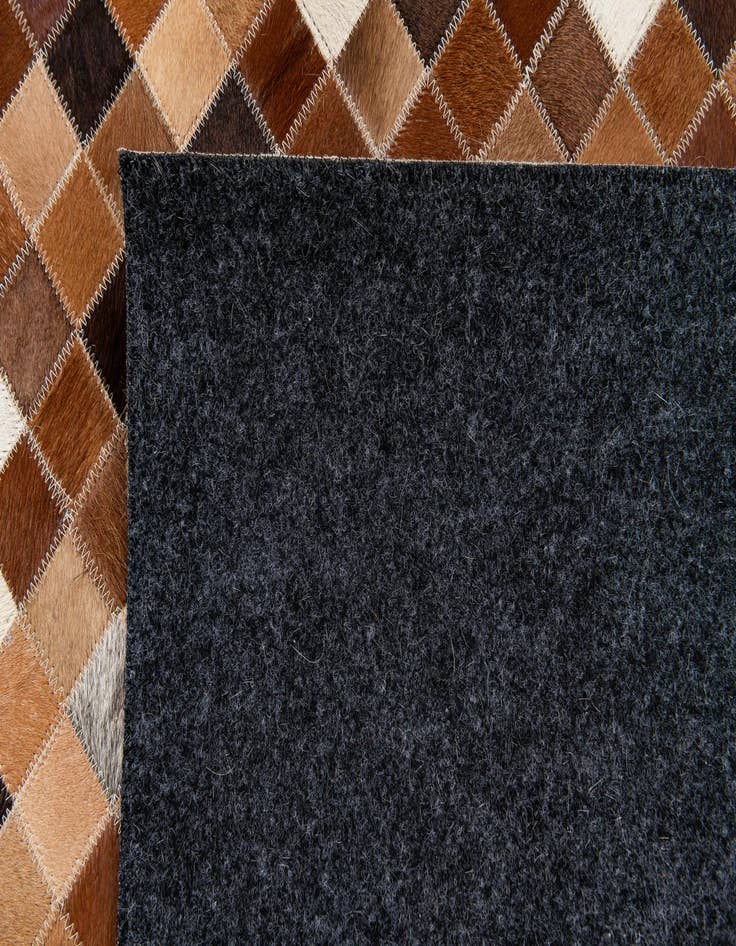 Detail image of  5' 9 x 8' 1 Cowhide Stocks Rug