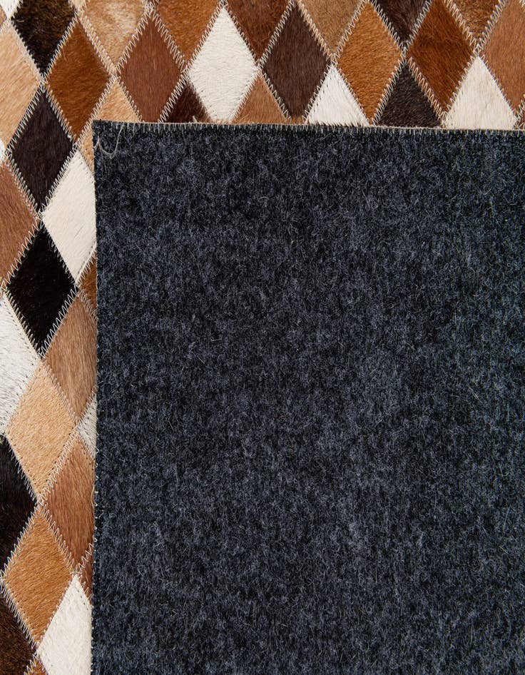 Detail image of  5' 9 x 8' 1 Cowhide Stocks Rug